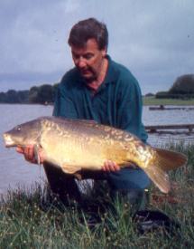 Jim with a nice mirror carp